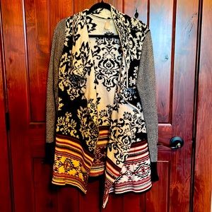 Red, Black, and White L sweater from Vanity